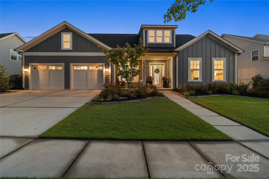 Sophisticated design meets effortless living in this 1.5-story Paddlers Cove residence. From the serene primary suite, 2 walk-in closets, & spa-inspired bath flows past the elegant planning center—ideal for a secondary office or private work space—directly into the gourmet kitchen & expansive open living areas. Quartz countertops, designer finishes, oversized island, gas stove, & thoughtful details elevate every space. The flexible upstairs retreat offers a private bedroom, full bath, & loft, perfect for guests or multi-generational living. Outdoors, a screened porch with floor-to-ceiling stone gas fireplace overlooks a paver patio & fenced yard, creating an inviting setting for year-round enjoyment. Enhanced with tankless water heater & outdoor irrigation, this home blends comfort & efficiency—just minutes from Lake Wylie, shopping, dining, & award-winning Clover schools.
*TANKLESS hot water heater, outdoor IRRIGATION SYSTEM
*premium sun-shades(back porch)
*cpi security system