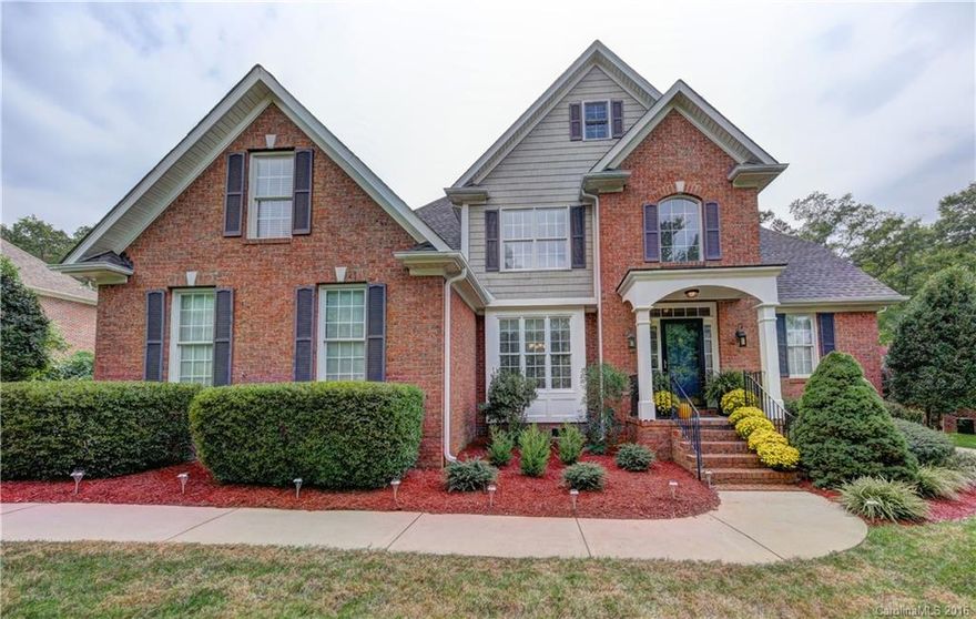 Beautiful two story brick home in The Summit.  Features include hardwood floors, 2 story great room, formal dining room, kitchen with breakfast bar and eat in area, screened porch, oversized garage and landscaped lawn with in-ground irrigation system. Upstairs bonus room could be converted to a bedroom.
