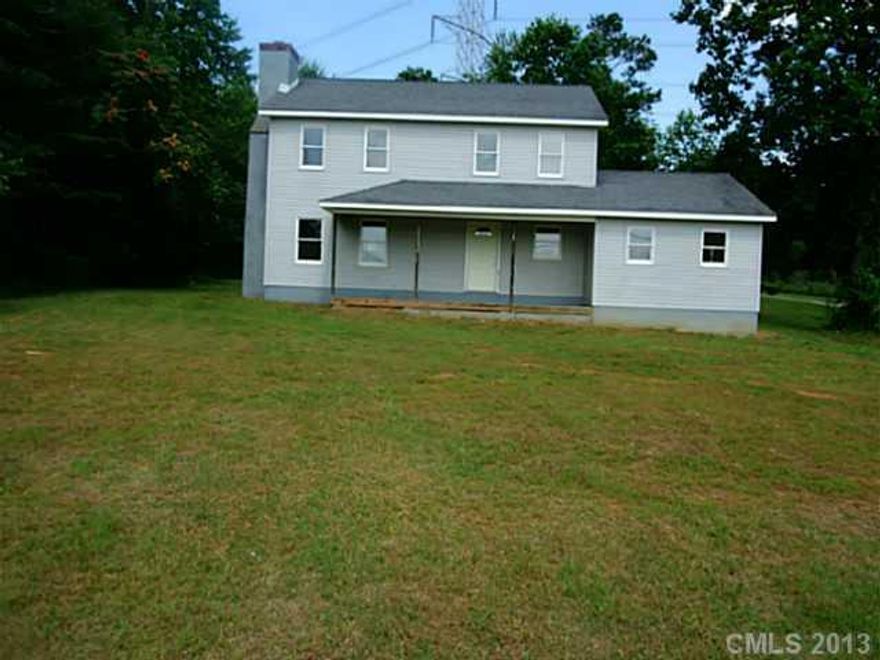 This is a partially completed dwelling. Construction was started in 1997. Exterior, doors, windows and roof are complete. Interior wall studs are in place with out insulation. Most of electrical rough in is complete. Water heater and tubs are in place. There are two fireplaces. Tax record indicates construction is 55% complete. Opportunity awaits a motivated buyer.