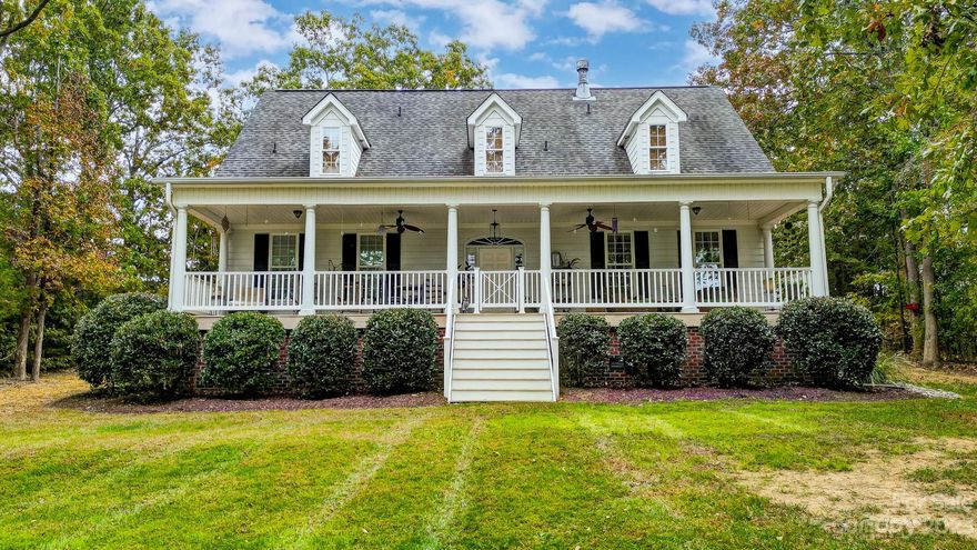 Beautiful custom built 1.5 story in the country on 4 acres. open floorplan, vaulted Great room w/balcony. Primary BR on main. Upgraded Kitchen, Bar w/breakfast area. 3 BR & Bonus rm or office. 3 Full Baths, 1 half bath, Hardwood floors, Tile Baths & Kitchen area. Very nice Brick paver patio w/ outdoor lights. Screened porch, rocking chair front porch. 20x25 detached garage, Gated Driveway, 
Private setting.