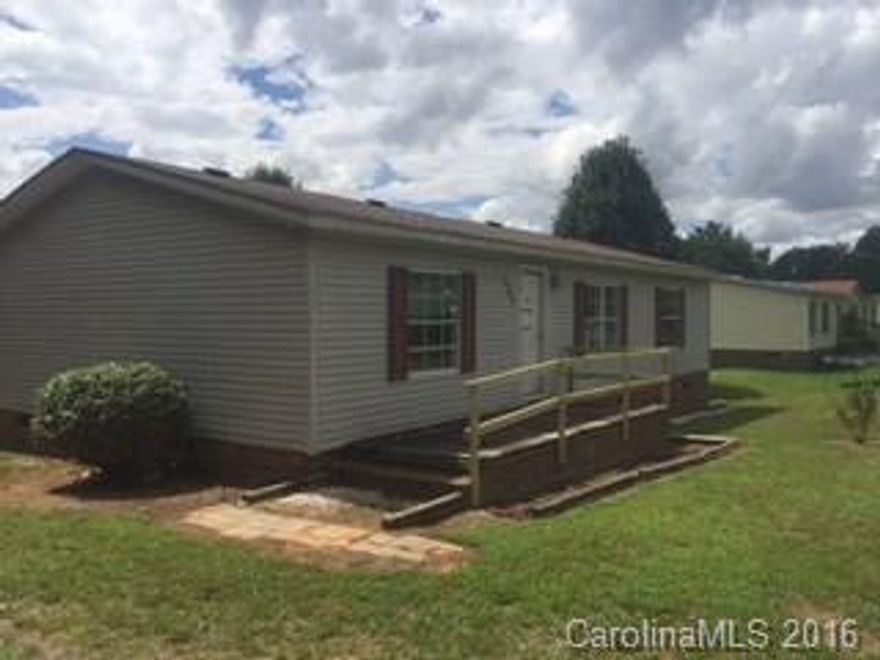 3 bedroom 2 bath mobile home sold as-is.  Brick underpinned and located on almost an acre of land.
