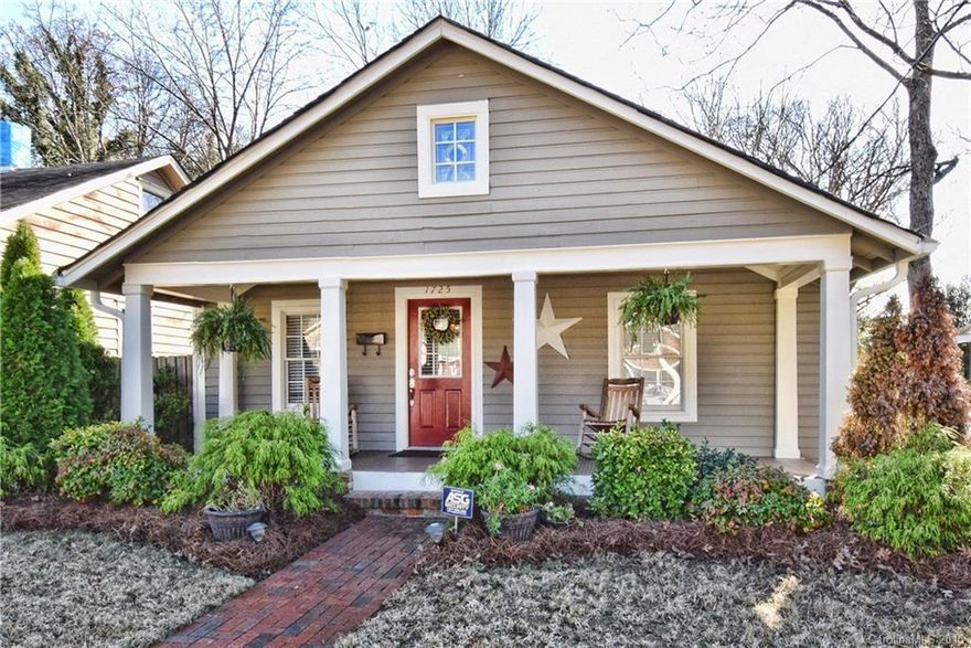 FULLY RENOVATED BUNGALOW IN  WILMORE!  Great open floor plan with hardwoods, tile and 2 piece crown throughout the main living area.  Large WIC in master bedroom. Dual shower heads in vaulted master bath.  Jack and jill bath with bead board and trim join bedrooms two and three.  View the city from tongue and groove front porch or entertain on covered  deck and large patio in back.  Fenced in lot with mature landscaping. Walking distance to stadiums and all attractions the South End has to offer.
