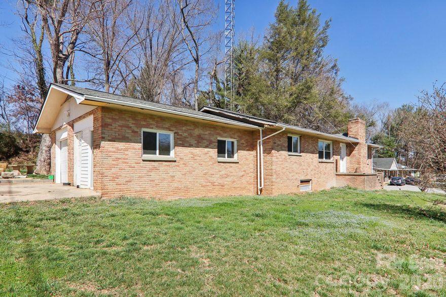Is there a 3-bedroom brick rancher under $300K in Haywood County with updates, basement space, and income potential?** 541 Paragon Parkway delivers with fresh interior updates, 1,712 square feet of living space, a full unfinished basement ready for expansion, and a rare billboard lease producing approximately $2,200 per year.

Welcome to 541 Paragon Parkway, a classic 1953 brick ranch home offering approximately 1,712 square feet of living space on a generous 0.5-acre lot in a convenient Haywood County location close to everyday amenities.

This 3-bedroom, 1 full bath, and 1 half bath home features a practical layout with recent improvements already completed, making it ready for occupancy, rental income, or future updates.

Recent improvements include:

• Fresh interior paint throughout the home
• New carpet in key living areas and bedrooms
• Durable new vinyl plank flooring
• New garage door for the attached one-car garage

The home also includes a full unfinished basement, offering significant additional square footage for storage, workshop space, or future finished living areas. With some sheetrock already in place, the basement provides a strong starting point for buyers looking to add value or expand usable space.

A truly unique feature of this property is the billboard located on the property that generates approximately $2,200 annually, creating a rare passive income opportunity that can help offset ownership costs.

Situated on approximately half an acre, the property provides space to enjoy the outdoors while still being conveniently located near shopping, dining, schools, and major routes throughout Haywood County.

Whether you're looking for a move-in-ready home, an investment property, or a place with future potential, this 3-bedroom brick rancher offers solid construction, recent updates, expansion possibilities, and a unique income-producing feature rarely found in residential properties.