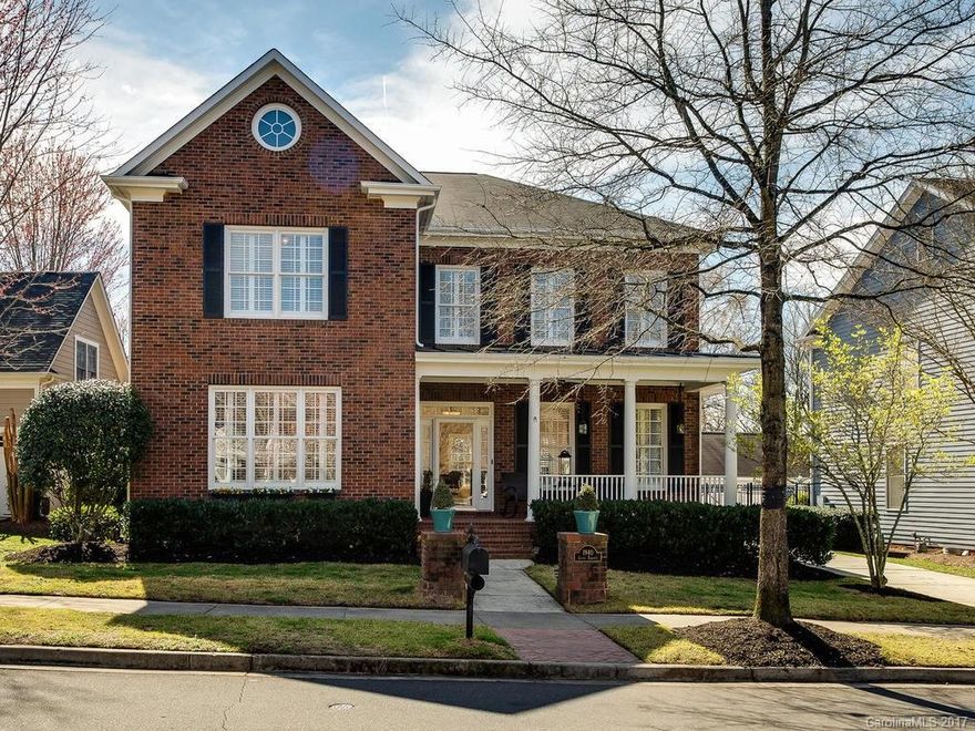 This gorgeous ALL BRICK 4BR/3.5BA home is situated on a pocket park in Baxter Town Center.  The property is loaded w/ extras: Brazilian Cherry wood floors, 42" custom cabinets, plantation shutters, 10 foot ceilings on 1st level, chef's kitchen w/ double ovens. MBR on main w/spa bathroom, whirlpool tub, dual closets & sinks. Lrg. BRs, bonus, & guest suite, dual laundry, tklss hot water heater, surround sound, brick driveway, fantastic fenced outdoor space, irrigation, southern porch & much more!