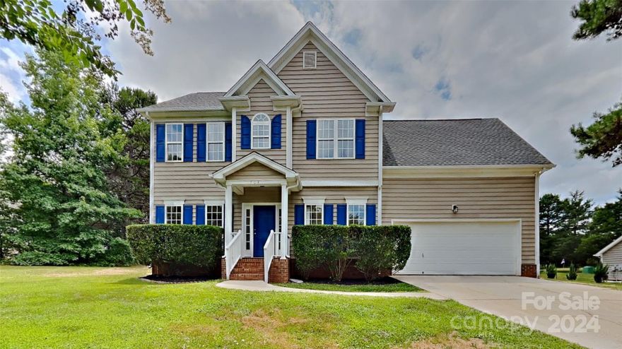 This charming two-story home features four spacious bedrooms and 2.5 baths, perfect for families or those seeking extra space. Fresh interior paint throughout enhances its inviting atmosphere, while a cozy fireplace in the living area creates a warm focal point for gatherings. The large backyard, surrounded by mature trees, offers a serene outdoor retreat, ideal for relaxation, play, or entertaining. With its thoughtful design and picturesque setting, this home is a perfect blend of comfort and nature.