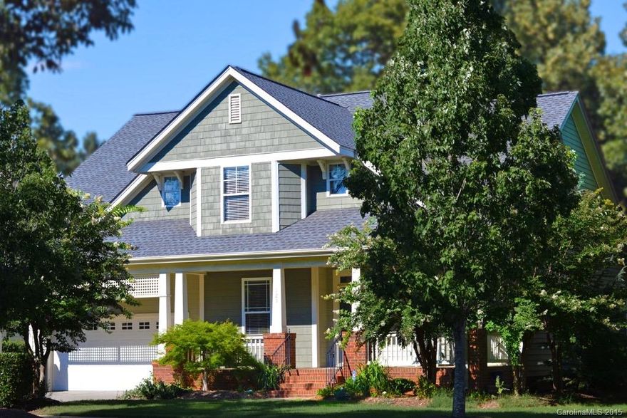 Saussy Burbank home. Columns outline beautiful front porch, elegant
living & dining. Deck offers outdoor retreat & natural woods-low
maintenance. Master main-Jacuzzi bath, shower, w/c. & walk-in. Three
beds up, full bath & bonus room. Distinctive upgrades include-crown
molding, vaulted & 10 FT ceilings, hardwoods, Fr. drs. Family room
ideal for entertainment. Unfinished storage–add’l bath, study.
Playground, lake access, & trails. Lakeshore Recreational Community-5
min walk to Lake Wiley.