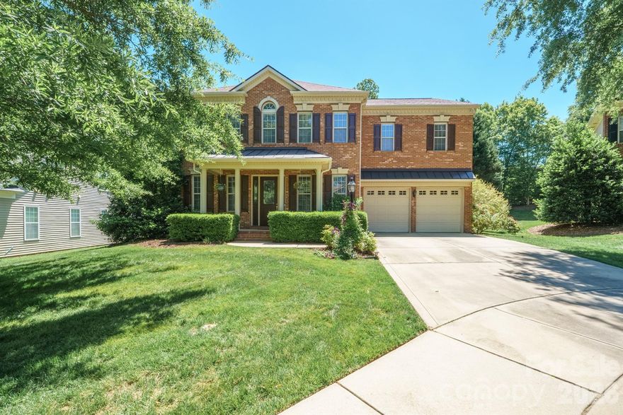 Welcome to this stunning 4-bedroom, 3-bath home in the desirable Prescot neighborhood of Waxhaw. Perfectly situated on a quiet cul-de-sac, this timeless brick residence offers exceptional curb appeal and a beautifully maintained presence. A brand-new roof and professionally landscaped grounds create an inviting first impression, setting the stage for both relaxed living and effortless entertaining. Step inside to soaring 10-foot ceilings and 8-foot doors that create a bright, spacious atmosphere. Wide-plank engineered hardwood floors flow seamlessly throughout the main and upper levels, adding warmth and elegance to the thoughtfully designed layout. A versatile flex room with French doors off the foyer is ideal for a home office, playroom, formal sitting area, or creative studio. The formal dining room opens directly into an expansive open-concept living space, where the family room, kitchen, and breakfast area blend perfectly for everyday living and memorable gatherings.
Additional main-level conveniences include a practical drop zone, private laundry room, and direct access to a screened-in porch and expansive brick paver patio. The fully fenced, lush backyard offers privacy and play space, complete with a charming storage shed with electricity for lawn equipment or hobbies. Smart-home features such as a smart thermostat and automated irrigation system provide modern convenience and efficiency.
Upstairs, the generous primary suite serves as a true retreat with a luxurious en-suite bath and oversized walk-in closet. Three additional bedrooms, all featuring walk-in closets, provide excellent flexibility: two share a convenient Jack-and-Jill bathroom, while the fourth enjoys its own access to a full hall bath. A large bonus room upstairs offers versatile space for a media room, home gym, playroom, or guest suite. Located in the heart of Waxhaw’s Prescot community, this home is just minutes from top-rated schools, shopping, dining, and everyday conveniences. Combining classic Southern charm with thoughtful modern updates, this move-in-ready residence is a rare find. Schedule your private showing today and make it yours.