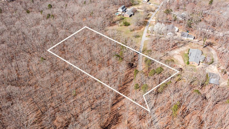 Looking for peace and quiet but don't want to be far from shops and entertainment?   This is the lot for you!  This 5 acre lot is tranquil and the perfect place to call home after a long day.  Very close to the NC/SC border. Come and build your dream home-no mobile homes. Stick built or true modular homes to be built on the property. At least 315' of road frontage.  Look for the sign on the left hand side.