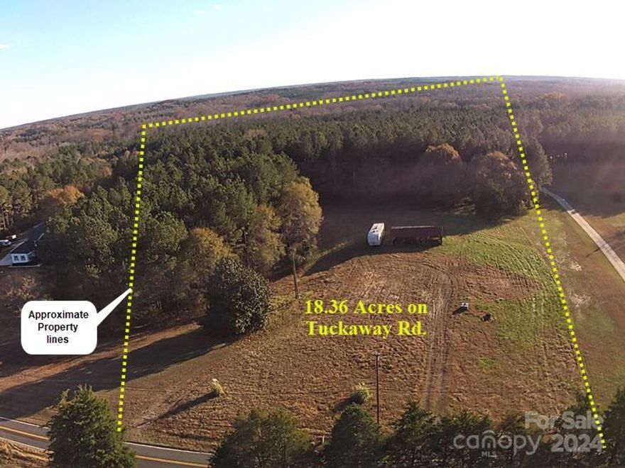 This land is located in a very sought after area of York County.  In the country but convenient to Rock Hill & Charlotte.  Tuckaway is a two-lane state maintained  paved road.  Fast wi-fi and natural gas available on this road.  Land is well suited for country estate, horse farm and or a family compound setting.  One home site has been permitted for a standard septic to serve up to a 5 bdrm. home.  Other nice home sites about midways into the tract.  Possible pond site near the southeast corner of the tract.