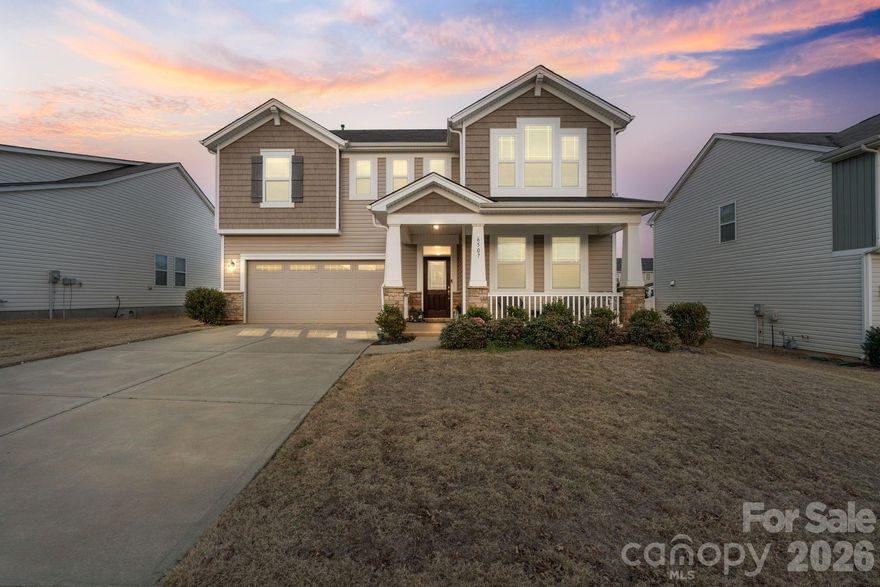 Welcome to this beautifully maintained, like-new home in the wonderful Cheyney subdivision. The sellers have taken exceptional care of this property with fresh paint touch-ups, professionally cleaned carpets, and meticulous upkeep throughout—making it truly move-in ready. From the moment you arrive, you’ll love the stunning curb appeal with stone veneer accents and charming craftsman-style architecture. Enjoy quiet mornings with coffee or relaxing evenings on the inviting front porch.

Inside, a versatile flex space at the entry is perfect for a home office or sitting room and flows seamlessly into the open-concept main living area. The chef’s kitchen shines with a large island, walk-in pantry, beautiful cabinetry, upgraded gas range, and plenty of space to gather and entertain. A bedroom and full bath on the main level offer an ideal secondary suite for guests or multigenerational living.

Upstairs, you’ll find all the space you need with a bonus loft and four additional bedrooms, including a spacious primary retreat featuring walk-in closets and an impressive en-suite bath.

The location is unbeatable with quick access to Uptown Charlotte, Huntersville, I-485, I-77, and I-85, plus close proximity to restaurants, grocery stores, and entertainment. Residents also enjoy outstanding community amenities including two pools, a clubhouse, playground, sidewalks, and street lights.

Don’t miss your opportunity to own this beautifully cared-for, move-in-ready home in one of Charlotte’s most convenient locations.