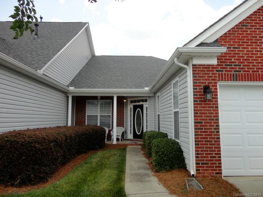 One owner well maintained end unit in 55+ Active Community. Rocking chair front porch.  Beautiful entrance with hardwoods in foyer, hall, kitchen.  Upgraded Berber carpet freshly steam-cleaned.  Crown molding in foyer, LR and DR.  Master suite with 2 huge closets, soaking tub and separate shower. Lots of windows including 2 bay windows--great natural light. 2" Blinds; 9' smooth ceilings; gas fireplace in great room with vaulted ceilings.  Awesome townhouse and community! Open layout.