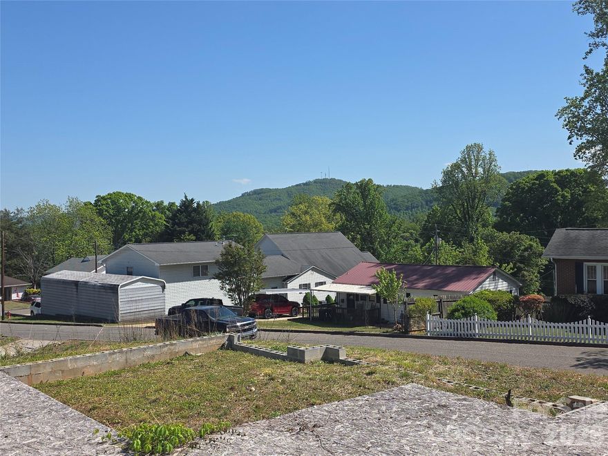 .4 acre residential lot close to downtown Marion. Home foundation and pool in place. City water and sewer. Elevated, level home site with a nice view.