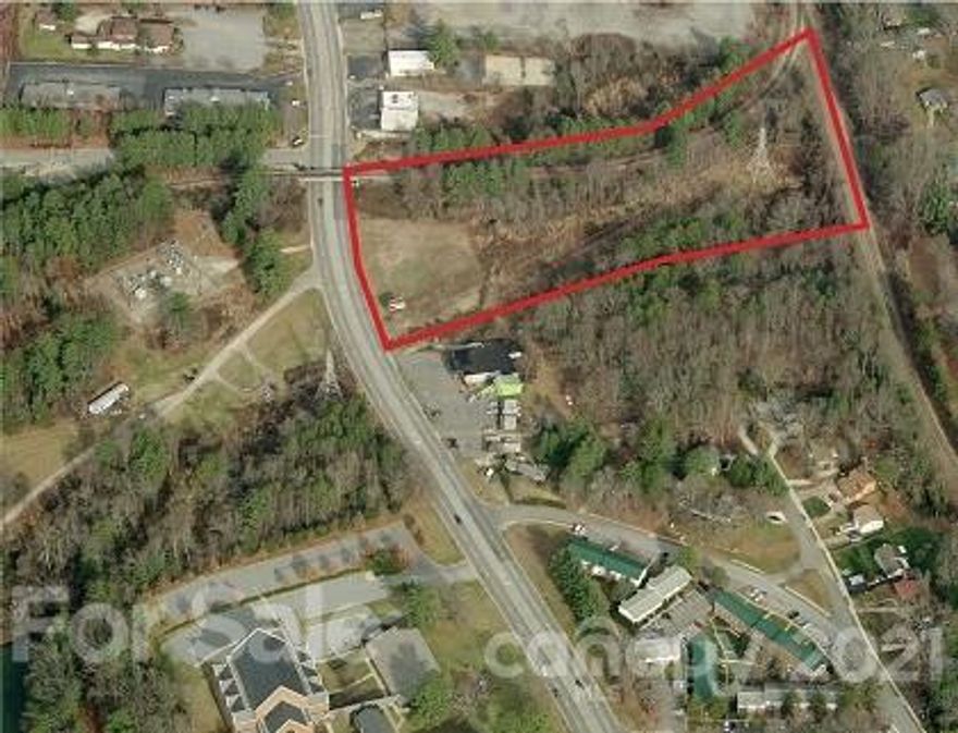 At 5.64 acres, this property is one of the larger open pieces on land on busy Hendersonville Rd in South Buncombe County.  Located very close to Linamar, this property would be an excellent location for your business if you would like visibility and convenience.