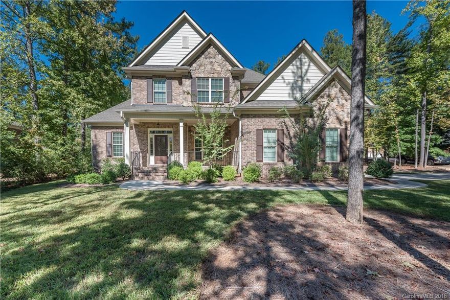 Beautiful custom built home in the highly sought after Water Edge community. Home is on a large .80 lot with major curb appeal. Open floor plan hosts a large dining and living room with 10 ft ceilings. Gourmet kitchen w/island. Master suite on main level with private bath and oversized walk in closet. Upstairs has 3 oversized bedrooms, bonus and bath w/9 ft ceilings. Stunning custom crown moldings throughout. Home is only 2 years old! Come see this great property before it is SOLD!