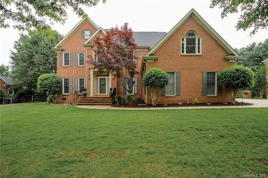 Stunning and spacious 2 story, 5b/3.5b+bonus home in The Hamptons community Gorgeous hardwoods, spectacular kitchen w/ granite, ss appliances, & abundance of storage. Memories are made w/ incredible screened-in porch w/ TV hookup & wood plank ceiling, fire pit & hot tub on patio. Rm for 2nd fridge in laundry, bonus with built-in’s, & plenty of closet space. Larger home community has 2 pools, tennis courts, playground, & club house. Shows like new! Solar system feeds the water heater!!