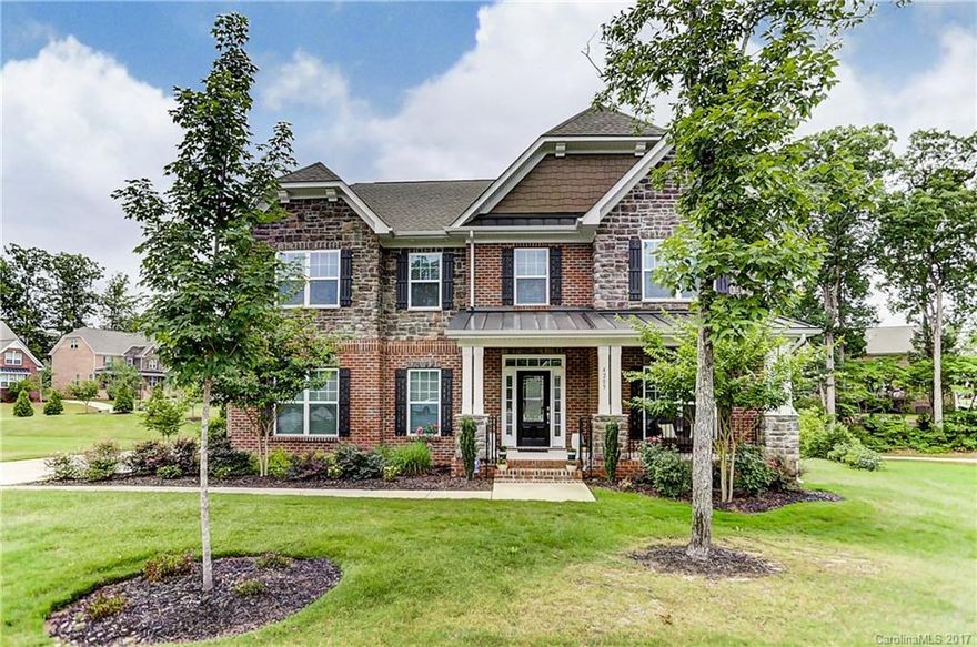 3-Story All Brick Beauty in Lawson! Front Porch Welcomes to Entertainer's Dream w/ Wood Floors on Main, Office, Formal Dining, Great Room, Breakfast, & Gourmet Kitchen w/ Granite, Tile Backsplash, Upgraded SS Appliances, Double-Ovens, 5-Burner Gas Stovetop, Island Seating, Recessed Lights. 2nd Floor w/ Double Owner's Suites, 2 Add'l Bedrooms, Full Bath. 3rd Floor w/ Bonus, Bedroom, Full Bath. 3-Car Garage, Extended Deck, Patio & Treed Landscaping *Amenity-Filled Community & Sought-After Schools*