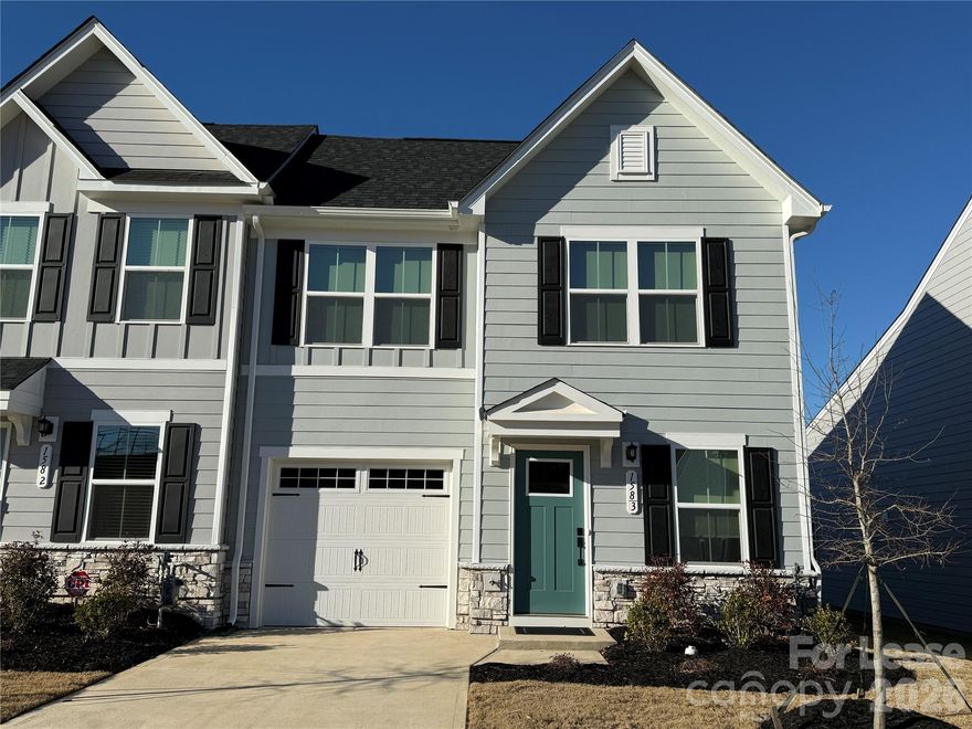 BRAND NEW 2-story END UNIT townhome in the new community of Smith Village! Be the first to live in this spacious townhome that has main level with Living Room with ceiling fan, Laundry with Washer/Dryer included, open Kitchen with island, Quartz counters, tiled backsplash, under cabinet lighting, Pantry and stainless appliances, and an Dining area with sliding doors to the rear Covered Patio. PRIMARY BEDROOM SUITE ON MAIN LEVEL has a walk-in closet, ceiling fan, dual sink vanity and a separate tiled shower. The upper level has 2 spacious Bedrooms with a 2nd Full Bathroom as well as walk-in attic storage. Parking for two vehicles in the garage and driveway. The community amenities include a pool and walking trails. This home is also conveniently located about a mile off I-77 at Exit 42 and minutes to Troutman schools, shopping, and restaurants! Tenant is responsible for all utilities and watering the lawn when needed. The HOA maintains the exterior lawn and landscaping areas. No Smoking and 1 Pet under 40-lbs at adult weight is conditional with a $500.00 non-refundable pet fee AVAILABLE NOW!