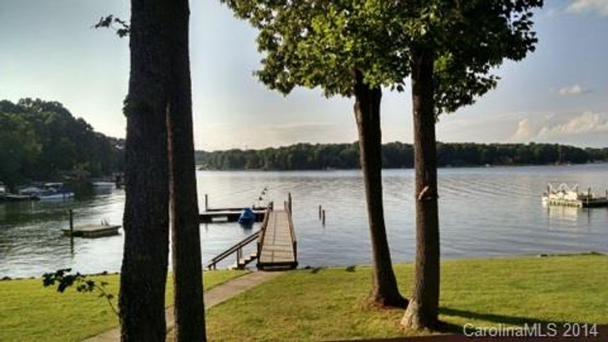 Tanquil lake living at its finest.  Great neighborhood. No HOA.  Approximately 155 feet of lake frontage.
Vaulted Ceilings. Home is in Excellent condtion.    Deep Water with a swim out pier.  Minutes to main channel.  New Pier with Composite Decking.  Roomy storage building with power. Gas  logs! New Roof in 2009.  2nd owner of this undisturbed piece of paradise.