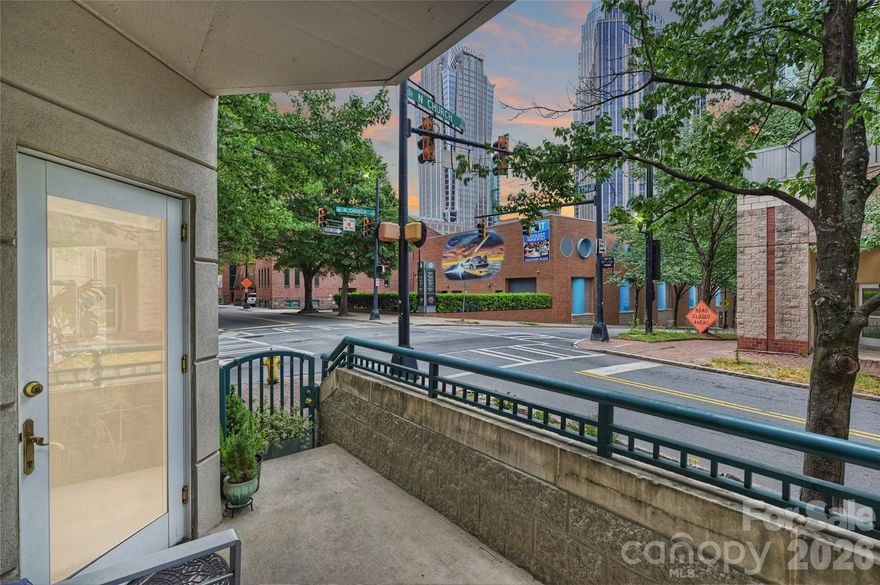 This is not your typical Jefferson Square condo.

Unit 103 is a rare 3-bedroom, one-level corner residence with a true walk-out patio and iconic Uptown skyline views—offering a level of outdoor living most units simply don’t have.

While others feature balconies, this one opens directly to an expansive patio—your private front porch to Uptown—creating a seamless indoor-outdoor flow that lives more like a home.

Enjoy the ease of direct, street-level access—no elevators, no long hallways—just a simple, private entry that adds everyday convenience rarely found in condo living (and yes, your pooch will love it too).

A proper foyer entry sets the tone, leading into light-filled living spaces where windows wrap the home with natural light. The living area is anchored by a gas log fireplace and connects effortlessly to the patio. The updated kitchen features Bosch appliances, a functional breakfast bar, and generous workspace and storage, while a full-size laundry room adds everyday practicality.

The primary suite offers impressive scale, a walk-in closet, and an updated bath with a new glass shower door. Secondary bedrooms are thoughtfully separated, including a flexible third bedroom ideal for guests, office, or den.

Two deeded parking spaces and a private storage unit complete one of the most compelling offerings in the area.

Perfect for the walkable Uptown lifestyle—everything from coffee and dining to parks and entertainment just outside your door, with Harris Teeter just a couple of blocks away for everyday ease. Located in Historic Fourth Ward, just one block from Fourth Ward Park, with tree-lined streets and Victorian homes woven throughout. From here, Uptown unfolds around you—Romare Bearden Park, Truist Field, Spectrum Center, and Bank of America Stadium all within easy reach, along with museums and performing arts venues like Blumenthal Performing Arts Center and Discovery Place. The future Main Library—a transformative 115,000-square-foot development opening in 2027—adds even more to this already connected and vibrant setting.

Rare layout. True outdoor living. A condo that lives like a home.

Opportunities like this are limited—and they don’t come up often.