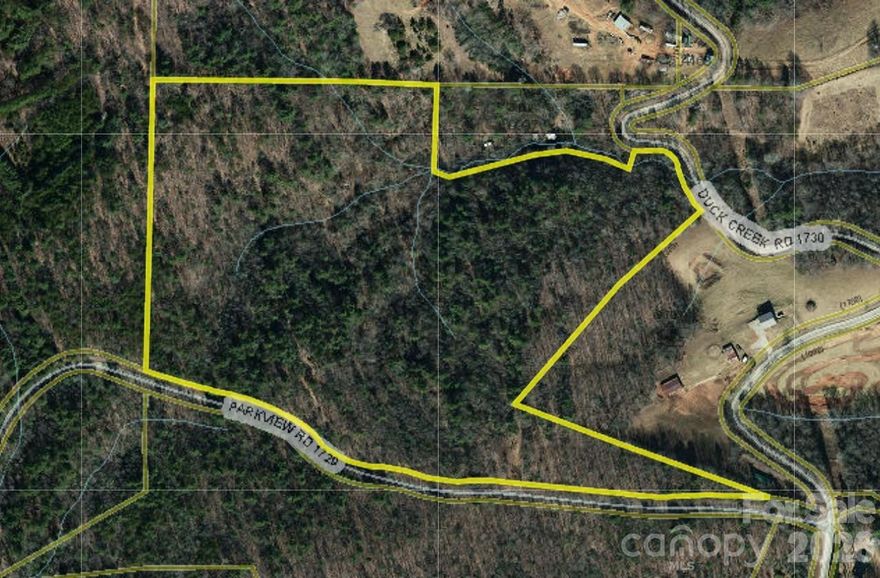 With two entrances, Duck Creek Rd & Parkview Rd, this beautiful, tucked away 35.7-acre wooded tract offers a wonderful opportunity to build your dream home in a peaceful natural setting. With generous road frontage providing easy access for a future driveway, the property presents several potential homesites nestled among mature trees for privacy and scenic views.

The land features a rolling topography with gentle slopes and some steeper areas, creating character and opportunities for a thoughtfully designed home placement. Three branch creeks run through portions of the property, adding to the natural beauty and creating a tranquil backdrop.

A septic permit for a 4-bedroom home was established approximately two years ago, providing a helpful head start for future construction. A well will be needed.

Great location close to Lenoir, Taylorsville, and Hickory, offering the perfect balance of peaceful country surroundings while remaining convenient to shopping, dining, and everyday amenities.