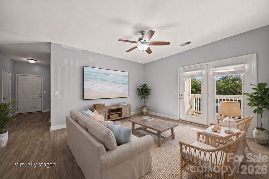 NEW STAINLESS STEEL APPLIANCE PACKAGE installed 4/18, new kitchen photos coming 4/22. Unbeatable value and versatility in Cornelius! This spacious Alexander Chase condo is a rare find, offering two large bedrooms PLUS a dedicated flex room- the perfect "3rd bedroom" option, home office, or hobby space.  Enjoy direct access to the McDowell Creek Greenway and walk to the premier dining, shopping, and cinema at Birkdale Village! You are also just five minutes from the new Atrium Health medical center and the waterfront at Ramsey Creek Park. The interior features an airy, open layout with 9-foot ceilings and durable vinyl plank flooring throughout- absolutely no carpet to maintain! The oversized primary suite serves as a true retreat, flooded with natural light from windows on two sides. A large kitchen w/new faucet offers a long breakfast bar and ample cabinetry, ready for your meal creations. Retreat to your private balcony, which includes a convenient storage closet for extra gear. For a truly seamless move, the never-used refrigerator, washer, and dryer are all included! Residents enjoy amenities including a pool, clubhouse and fitness center. The building's dual-entry layout keeps through-traffic minimal, offering a quieter, more private day-to-day experience. HOA dues cover water and trash, parking space #56 is assigned, and a one-year American Home Shield warranty (HVAC + major appliances) is included for peace of mind. Owner-occupants only for the first two years; rental cap has been reached with a waitlist in place. Up to two pets welcome.