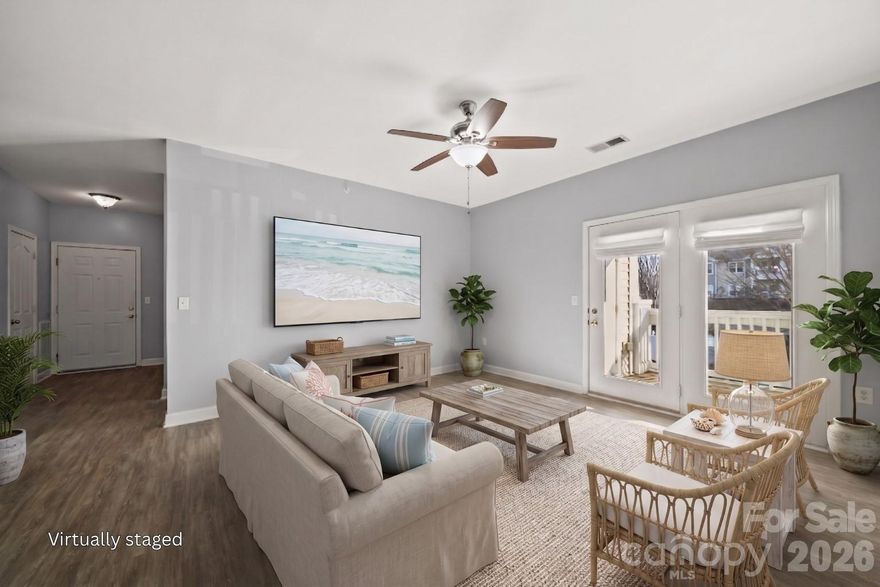 NEW STAINLESS STEEL APPLIANCE PACKAGE coming April 18th. Unbeatable value and versatility in Cornelius! This spacious Alexander Chase condo is a rare find, offering two large bedrooms PLUS a dedicated flex room- the perfect "3rd bedroom" option, home office, or hobby space.  Enjoy direct access to the McDowell Creek Greenway and walk to the premier dining, shopping, and cinema at Birkdale Village! You are also just five minutes from the new Atrium Health medical center and the waterfront at Ramsey Creek Park. The interior features an airy, open layout with 9-foot ceilings and durable vinyl plank flooring throughout- absolutely no carpet to maintain! The oversized primary suite serves as a true retreat, flooded with natural light from windows on two sides. A large kitchen offers a long breakfast bar and ample cabinetry, ready for your personal touch. Retreat to your private balcony, which includes a convenient storage closet for extra gear. For a truly seamless move, the refrigerator, washer, and dryer are all included! Residents enjoy amenities including a pool, clubhouse and fitness center. The building's dual-entry layout keeps through-traffic minimal, offering a quieter, more private day-to-day experience. HOA dues cover water and trash, parking space #56 is assigned, and a one-year American Home Shield warranty (HVAC + major appliances) is included for peace of mind. Owner-occupants only for the first two years; rental cap has been reached with a waitlist in place. Up to two pets welcome.