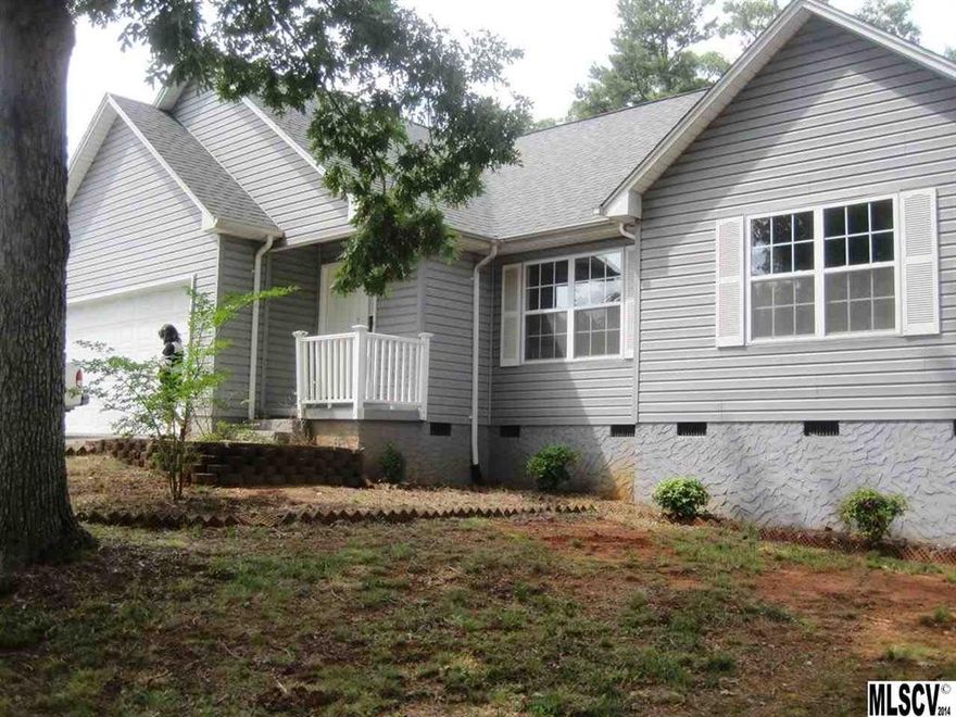 This charming 1.5-story home at 3 Oak Street in Granite Falls, North Carolina is on a half-acre and features 3 bedrooms, 2 bathrooms, and 1,497 square feet of living space. The kitchen features a breakfast bar and French doors leading to the deck in back. Two bedrooms are carpeted, while a third boasts gleaming hardwood floors. An attached 2-car garage is also onsite. Located a few steps from Billy Branch creek, the property is less than a mile from town center. Approximately 60 miles from downtown Charlotte