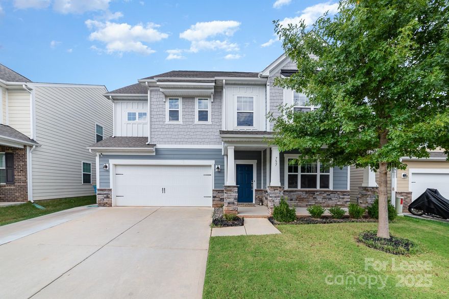 Step into this exquisite 5-bedroom home, where Southern charm meets modern comfort. The main level boasts a bedroom with an en suite and an open-concept design, creating a smooth flow between the living and entertaining areas. The kitchen features stainless steel appliances and a gas range. Upstairs, a spacious loft enhances the additional bedrooms, while the primary suite provides a private retreat for rest and relaxation.