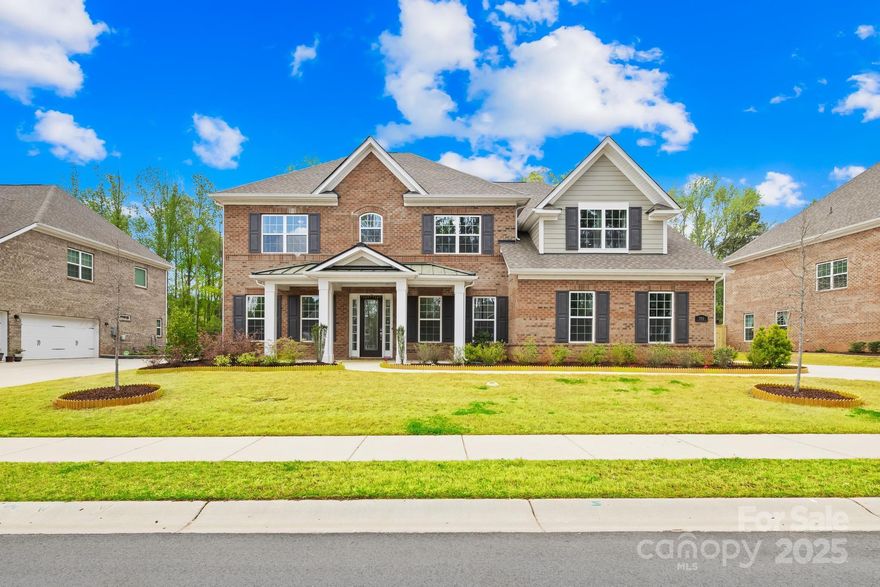 Classy estate type FULL-BRICK Single Family Home with Smart features in HARLOWS EST, facing North, zoned in top-rated Weddington schools, UNION tax DST.  Super bright (lots of natural light) prvt home with wooded front & back with side loading 3 CAR GARAGE with large driveways.  
Built in 2021, this 5BR/6BA masterpiece has serene walkway welcomes to the main porch & doorway into the main level.  The Foyer leads to study, dining suite, stunning Family Retreat, a cozy BR/BA, backdoor to covered porch & yard.  Open kitchen with LARGE ISLAND featuring QUARTZ countertops, STEEL appliances, UP-STACKED cabinets & RO equipped farm sink.
2nd level boasts a Magnificent Owners Suite with cozy sit-out & luxury BA, 3 BR with full BA & full-size Theater.  All baths equipped with framed mirrors and heated bidets.
With HW FLR (carpeted BR), custom chair rails & crown moldings all over home, smart-switches, 6 zone whole home channel music, state-of-art home cinema, security cameras & custom closets.