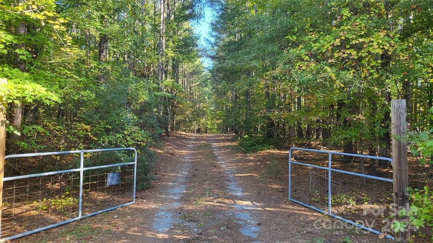 5.02 acres with mobile home and 840 sq ft 2 bay garage building on a concrete slab. In a scenic area less than 1/4 a mile from the NC state line, just off Hwy 522. Zone for Buford Schools. Mobile home and property are being sold AS IS, WHERE IS. Seller requesting highest and best offers due by Monday, October 28th at 5:00 pm