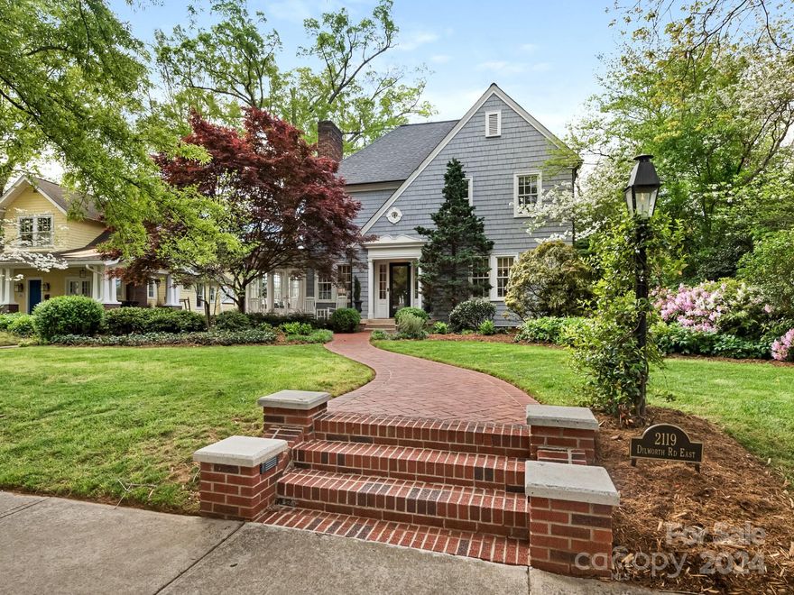 Quintessential Dilworth home sits on a spacious lot on one of the most coveted streets in Charlotte and features countless updates throughout! Impeccable curb appeal accentuated by beautiful landscaping and rocking-chair front porch. High ceilings and beautiful moldings. Oversized formal living and dining rooms plus lovely sunroom. Private guest suite is perfect for company. Updated kitchen features white cabinetry, granite countertops, high-end stainless appliances and sunny breakfast area. Huge primary suite has fireplace and spa-like bath with clawfoot tub, frameless glass shower, dual vanity with marble countertops and walk-in closet. 2 very spacious secondary bedrooms on upper level. Lower level den with surround sound and wet bar! Incredible outdoor living on the deck which overlooks the pristine yard plus side brick patio. Unbeatable location just blocks from all the shops, dining, and entertainment Dilworth has to offer and minutes to Uptown. Don't miss!