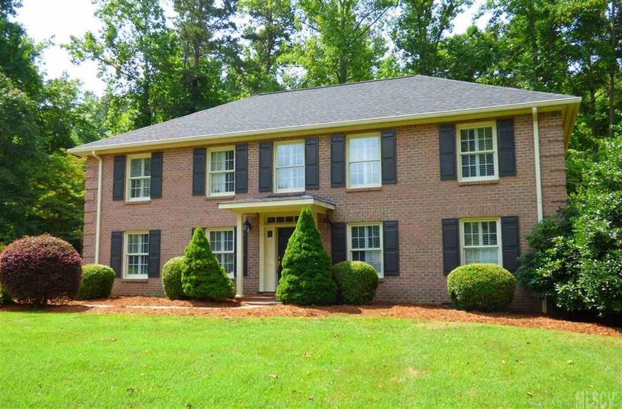 This stately all brick two-story home in Stonesthrow is ready for its new owner! Nestled into a private 0.89 acre wooded lot, this four bedroom home offers delightful custom touches throughout! A welcoming two-story foyer features a beautiful staircase and opens onto a great room with built-in shelving, vaulted ceiling, custom moldings, and an adjacent formal dining room. The oversized kitchen boasts high-end stainless appliances, center island, granite countertops, display cabinets, plus a breakfast nook and desk area. The main level is completed by a full bedroom and upgraded bathroom with tiled shower and granite-topped vanity. Upstairs, you'll find a spacious master suite with upgraded bathroom, featuring his/hers vanities, tiled shower, soaking tub, and walk-in closet. Two additional bedrooms and a bonus room share the third remodeled bathroom. Outside, enjoy the deluxe rear patio and fire pit in the tree-lined backyard. You won't have to do a thing to this house but unpack!!