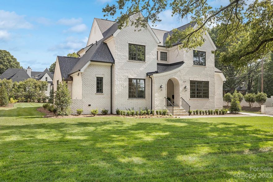 New Construction on .52 acre, nestled in one of the most sought after locations in the heart of Charlotte. Centrally situated minutes from SouthPark, easy access to Uptown and minutes from shops and restaurants. Built by Alan Simonini Homes, one of Charlotte's premier home builders with attention to detail and luxury finishes. Inviting floor plan with Primary Suite + Guest Suite on main level, kitchen equipped with high end appliances, custom cabinetry, and expansive island. Centrally located wet bar for entertaining, as well as covered porch with gas fireplace.  Bonus room on second level along with 3 bedroom each with private baths.  This home features a detached garage and a brick wall spanning Sharon Rd for privacy. This plan was previously designed and built as a custom home in the Heydon Hall community.