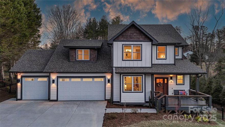 Introducing a better than new home nestled on 2 lots in a serene, walkable neighborhood convenient to all Asheville is celebrated for! Superlative fenced backyard for playing, gardening and watching fireflies under majestic oak tree. Functional above grade floor plan has sun-drenched spaces and distinctively curated finishes throughout. Fanciful chef's kitchen central to dining and living areas is perfect for entertaining. Main level complete with stunning primary BR suite featuring built-in closet and double vanity bathroom with laundry room adjacent. Upstairs, find additional 3BRs/2BAs and spacious Bonus room with wet bar - an ideal hangout, studio, or exercise space. EnergyStar certified and rooftop perfectly situated for solar. Attached 3-car garage provides EV charger and abundant storage capacity. Need RV parking or auxiliary structure? Vacant lot has utilities and extends to road. Prepare to be captivated by this extraordinary turnkey dwelling ready for you!