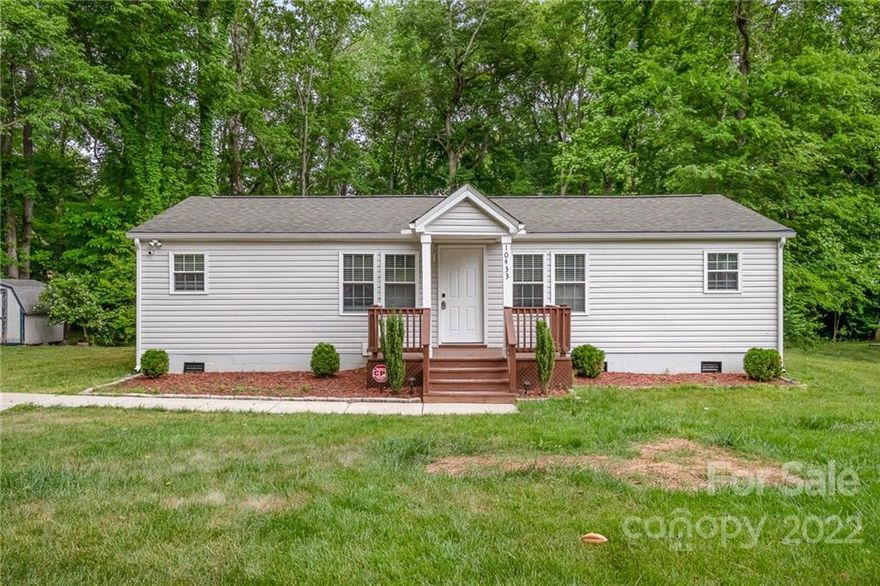 Adorable home with updated kitchen, great floor plan, spacious yard, updated baths and a large back deck.