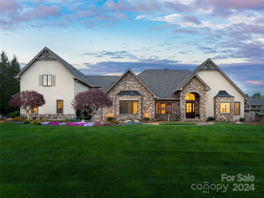 Welcome home to your tranquil haven, bathed in natural light and nestled on 2.23 acres in the picturesque Cane Creek Valley, offering breathtaking panoramic views. This residence boasts a gourmet chef-designed kitchen, an unparalleled four-season sunroom, four cozy fireplaces, and the rarity of single-level living. The owner's retreat is a sanctuary unto itself, featuring a fireplace, a sprawling bathroom, and a custom closet. Upstairs. An independent apartment awaits, ideal for accommodating an Au Pair, teens, or in-laws, complete with a separate entrance, elevator access, a spacious family room, vistas, an exercise room, and full kitchen. This home is thoughtfully designed for both comfort and convenience, featuring a four-car garage, a generator for uninterrupted power supply, a propane gas grill line, and radon mitigation. Welcome to a place where luxury meets functionality, where every detail is meticulously curated to enhance your lifestyle and elevate your living experience.