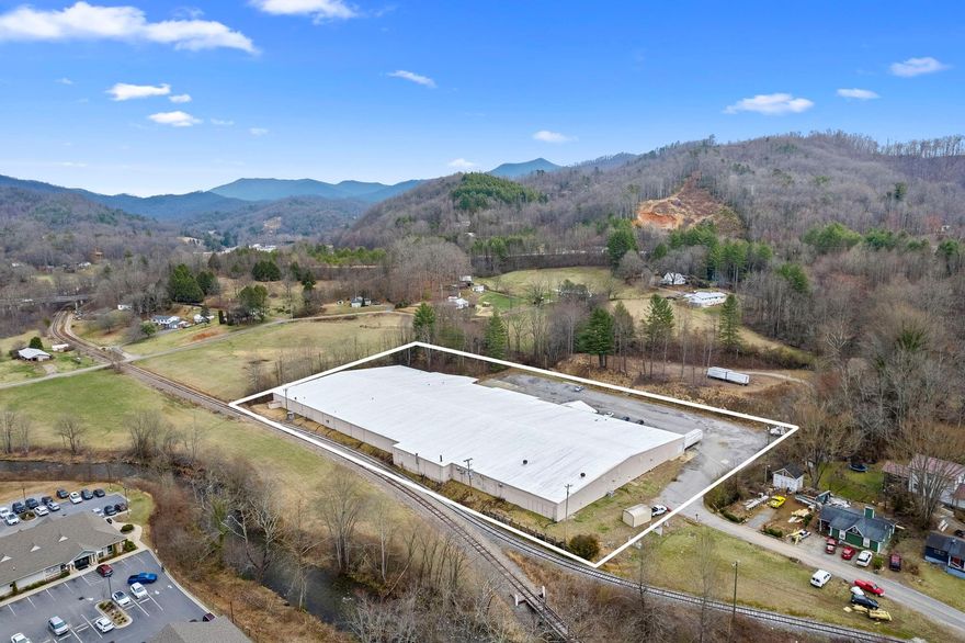 Presenting over 100,000sf of industrial space minutes from downtown Sylva. Roof installed in 2010. New boiler installed in 2010. An updated sprinkler system services the entire space. Multiple electric panels with 240 amp three phase and 2400 amps currently available. City water and sewer service the building. Rail service available via Blue Ridge Southern Railroad. The space can easily be divided by the future owner. Bay doors in place around the building. Contact listing agent for more details and to schedule your preview.