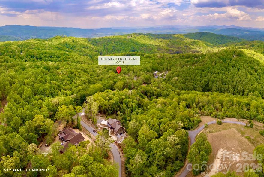 Welcome to 106 Skydance Trail, Lot 3 in the private mountaintop community of Skydance in Western North Carolina. Skydance is a special community offering the convenience, privacy, & natural beauty that the western North Carolina mountains are known for. It’s a private retreat without all the fuss of a country club community & only minutes from AVL airport, as well as the towns of Hendersonville & Brevard. Lot 3 is gently sloped & features beautiful hardwoods & other native flora. A seasonal spring-fed stream runs along one corner of the property, & there are 2 possible sites to choose from. One is near the road and is perfectly level, & the other is nestled in the woods. Electric is already at the site, the septic has been installed, the well permit obtained, and building plans are available. Skydance is close to Dupont State Forest, the Pisgah National Forest, & the Blue Ridge Parkway, as well as the Ecusta Trail, which is only about a mile down the road. Enjoy all that this beautiful area has to offer,  with a wide variety of outdoor recreational opportunities to choose from, including hiking, biking, fly fishing, waterfall exploring, rock climbing, and more.