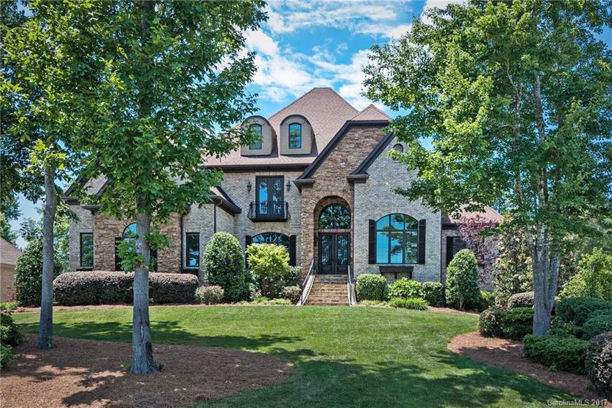 DROP DEAD GORGEOUS IN EVERY WAY! True custom SHOWPLACE in GATED Providence Downs South!  No detail missed in this former builders personal model home! Ultimate privacy surrounds this Dream backyard "Oasis" w/heated salt water pool/spa & outdoor kitchen. STUNNING open floor plan offers INCREDIBLE Kitchen w/dual islands & commercial grade appliances. IMPRESSIVE 1st floor Master Suite w/luxury bath! 5 Oversized Bedroom suites. Mud room, Game room w/custom bar & 3 Level Media room! WILL NOT LAST!!!!