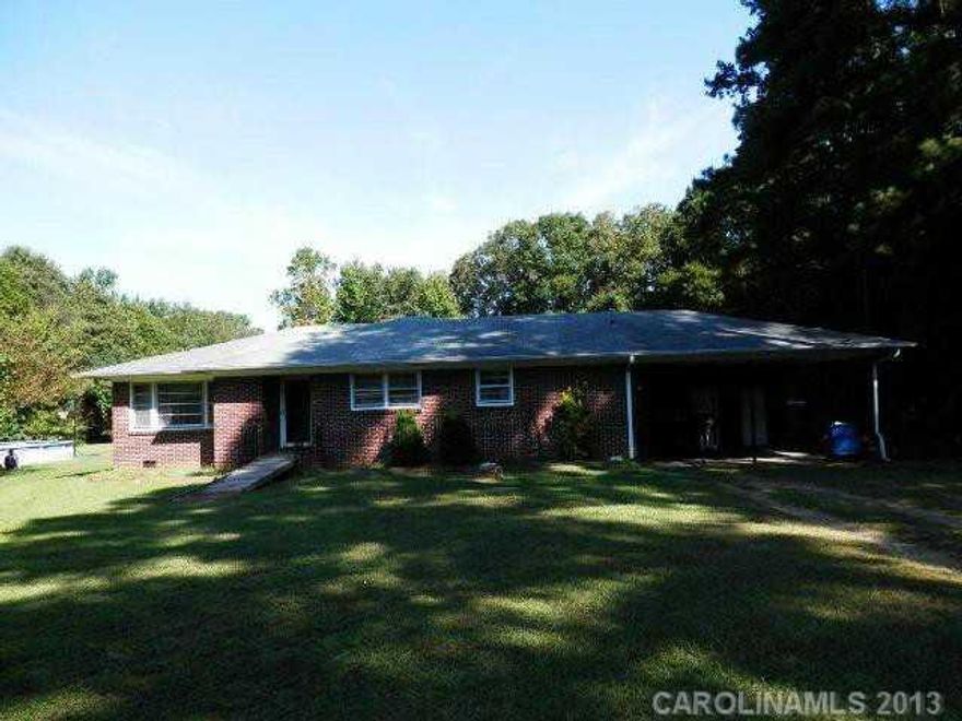 Brick ranch, large rooms, hardwoods, eat in kitchen area, large yard, carport, county taxes!. Heat 4 yrs old, septic 3 years old, detached storage. There is room to expand half bathroom and linen closet.