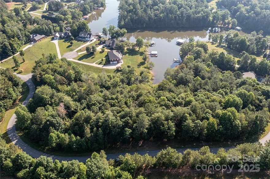 Build your dream home or create a family retreat with these 3 waterfront lots offering direct access to beautiful Lake Hickory! Enjoy ultimate privacy and endless possibilities—whether you're building a single home or a family compound. Lake Hickory is perfect for fishing, boating, water skiing, wakeboarding, paddleboarding, swimming, kayaking, canoeing, and all your favorite water activities! These lots are waterfront and allow easy access for launching your kayak or paddle board. You cannot have a dock here.