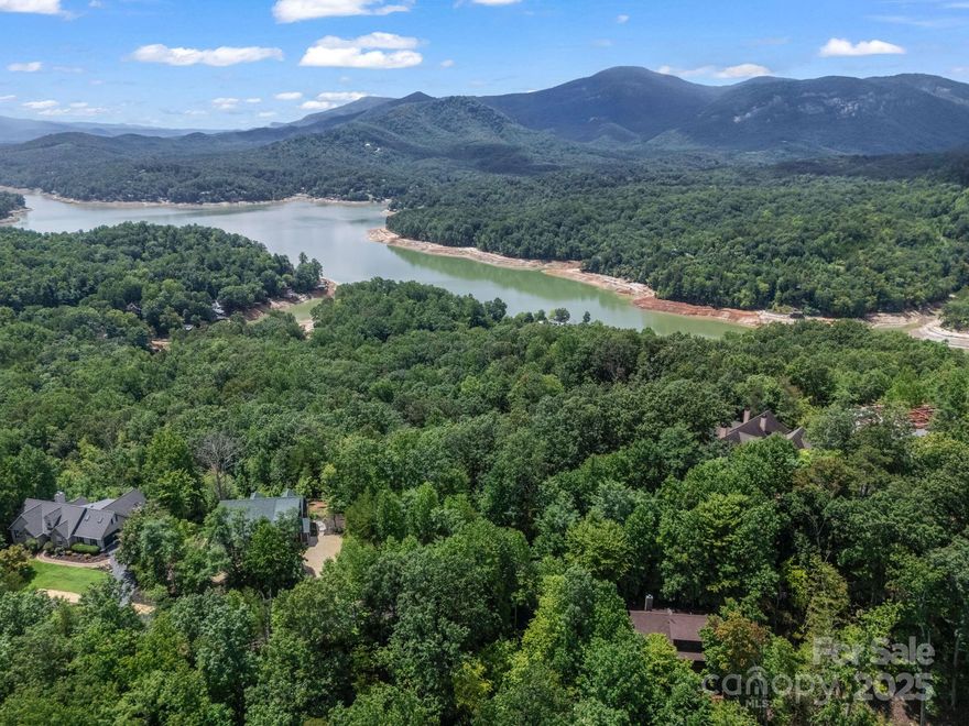 Stunning one of a kind views of Lake Lure and Long Range Mountain VIews! This lot is priced to sell! Lots on "The Ridge" at Shumont Estates are going fast!  This lot sits on the ridge top and overlook the center of Lake Lure, This neighborhood  features upscale homes on a paved road. Enjoy Rumbling Bald on Lake Lure amenities like two Championship Golf Courses, a private beach on Lake Lure, three pools, a Wellness Center, mini golf, tennis courts, hiking trails, boat rentals, and much, much more!!! Rumbling Bald has so much to offer! Close by there is also the world-renown Tryon International Equestrian Center and Chimney Rock State Park. Lot includes underground utilities including water, power, phone, and high-speed fiber optic Internet. The seller has archtectural drawings that are attached. We even have a builder that is ready to meet you at the lot to give a builder opion as you consider building your dream home!!!