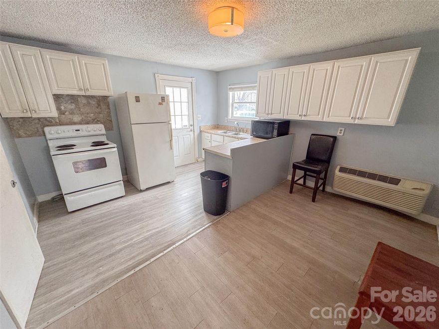 Opportunity awaits at 107 Drake Street in Gastonia! This 960 sq ft single-family home is currently configured with two separate entrances and a shared laundry area, offering flexible living arrangements and strong rental potential. While not legally a duplex, the property has been converted from its original layout (previously a 3bd/2ba configuration) into a 2 bedroom, 2 bath setup, creating an ideal scenario for house hacking, multigenerational living, or income-producing use. One side is almost rent-ready, while the second unit needs some TLC to be fully marketable. The home also features a detached two-car garage, providing additional storage, workshop space, or added rental value. With some cosmetic updates, this property could truly shine as a cash-flowing investment, flip opportunity, or affordable owner-occupant home with income potential. Conveniently located near downtown Gastonia, shopping, dining, and just a short drive to the growing FUSE District and Loray Mill redevelopment area, this property sits in an area experiencing continued revitalization and growth. Being sold as-is. Don’t miss the chance to add value and maximize returns in an appreciating location.