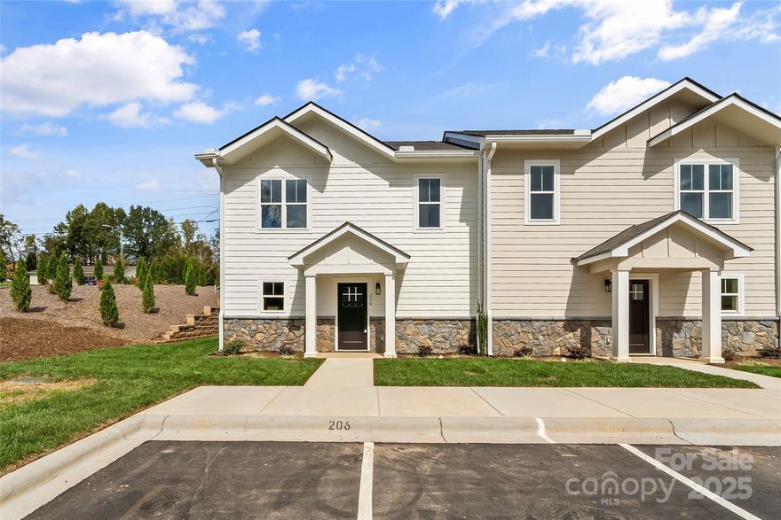 PHENOMENAL DEAL on this LUXURY townhome in Morganton with very close proximity to Downtown restaurants, shopping, schools and more! This END UNIT is currently listed $55,100 below 2024 appraisal value. Even better, the seller will assist with closing costs upon an acceptable offer. OPEN CONCEPT, LOW MAINTENANCE, TURN-KEY, low HOA, NO YARDWORK! The home features 3 beds / 2 full baths... a bedroom on the main and 3 walk-in closets. You will love the stylish kitchen with granite tops, white cabinets, breakfast bar, subway tile backsplash, and SS appliances. Luxury LVP hardwoods throughout, granite tops throughout, stylish lighting, Energy Star-rated HVAC, insulated windows, tiled baths, and 30-year roofs. Own for less than you can rent!