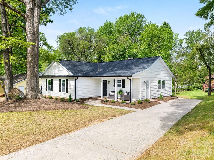 WOW "LIKE NEW HOME" - Don't Miss This Amazing Opportunity to Own This Charming Transitional Ranch Style Home Featuring 3 Bedrooms with Two Full Baths on Quiet Cul-De-Sac Street - Fabulous Curb Appeal with Covered Front Porch.  Foyer Opens To Great Room, Masonry Wood Burning Fireplace and Raised Hearth. Spacious Dining Room w/Double Windows (Natural Light). Kitchen with White Cabinetry, Quartz Countertops and Backsplash and New Stainless Steel Appliances. Fresh Neutral Colors (Sherwin Williams - Alabaster), New LVP Flooring Throughout, New Windows, New Roof, New Lighting and Ceiling Fans - Move-in Ready. Primary Bedroom with Private Bathroom Featuring Dressing Vanity and Tub/Shower Combination. Two Additional Bedrooms and 2nd Full Bathroom with Tub/Shower Combination. Sliding Glass Doors Open to Patio.  Welcome Home!