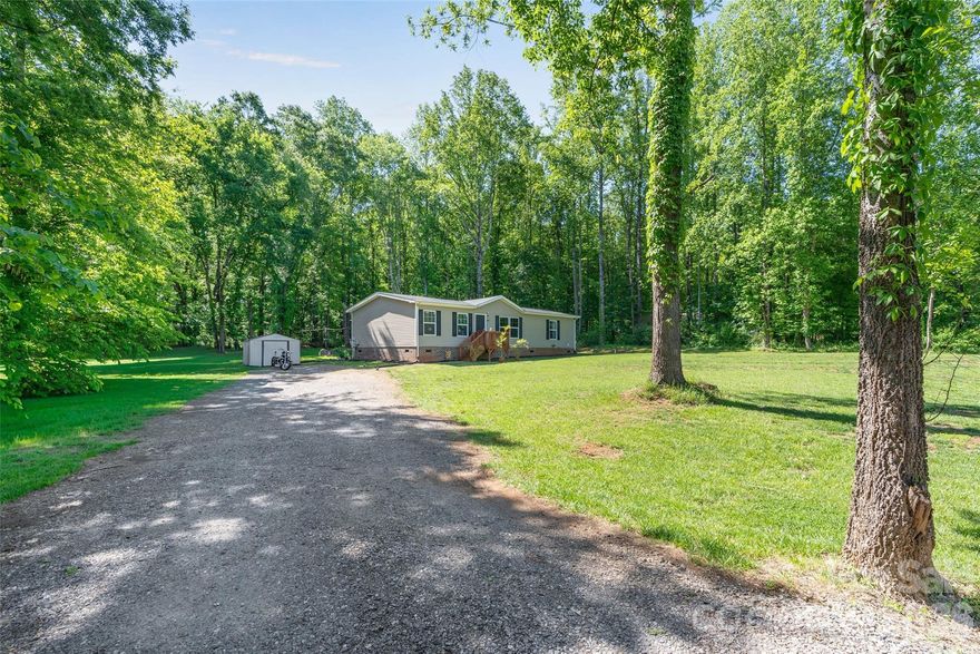 Welcome home to this wonderfully well-kept 2021 home that still feels like new just minutes from downtown Catawba. Tucked away in a private setting on a large lot, you are sure to get that "away from it all feeling". The interior boasts modern white and grey finishes; large rooms and each bedroom is equipped with a walk-in closet. The open floor plan allows for easy entertaining with the living room blending seamlessly into the kitchen and dining area. The house lives and feels cozy. Right off from the kitchen exiting outback, is a laundry room for dropping muddy shoes, or umbrellas on a rainy day. You will fall in love with the back screened in porch, showing off all of its capabilities to be a versatile space no matter if you're thinking of movie night, game night, or grilling space. It has been carefully crafted to encompass the serene views of the backyard but still offer cover from the sun, and the mosquitoes. It is sure to be one of the most used spaces of the house. Close to I-40 for easy commuting to Statesville or Hickory. Book your tour today.