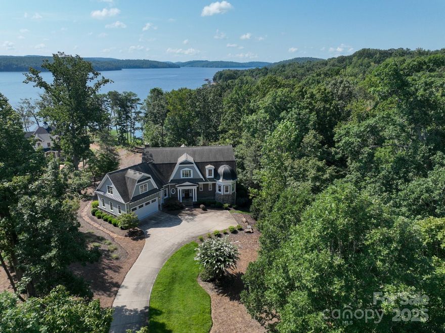 Experience lakefront living at its finest in this stunning 4-bedroom, 4.5-bath home located at the Old North State Club on Badin Lake. This property combines elegance, comfort, and lake views throughout. An inviting screened porch with a fireplace offers the perfect spot for year-round outdoor living. The deck is perfect for taking in the peaceful water views. Inside, the open and airy floor plan is designed for both everyday living and entertaining. The primary suite provides a private retreat, while three additional bedrooms ensure plenty of space for family and guests. Living at Old North State means enjoying world-class amenities, including a championship golf course, clubhouse, tennis, pickeball, swimming, walking trails, and marina access. Whether as a full-time residence or weekend getaway, this property offers a rare opportunity to enjoy the best of Badin Lake living. The club is private, but memberships are available.