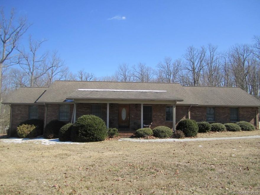 All brick, ranch home on almost 1 acre in quiet cul-de-sac. What more could you ask for?  Located just off of Hwy. 16 and convenient to Hickory and Charlotte.  New tile floors in kitchen and bathrooms with beautiful hardwoods in living and dining rooms.  Master bath has double vanity and his/her walk in closets.  Relax in the jetted hot tub!   Rooms are all nice and roomy, including a huge pantry. One year home warranty included.  Don't let this one get away!