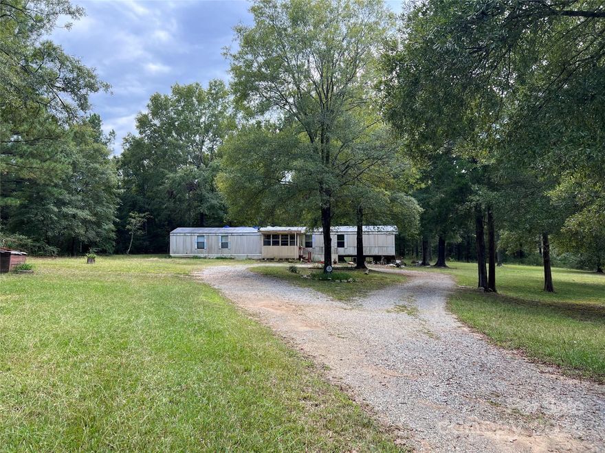 Location, Location, Location!  Investor special!! Great starter opportunity!  More than 4 acres of land in Lewisville School District near Gallo, Wagon Wheel, etc.  Land has well and septic installed. The mobile home currently on-site is being sold "as-is"; seller will make no improvements or repairs.