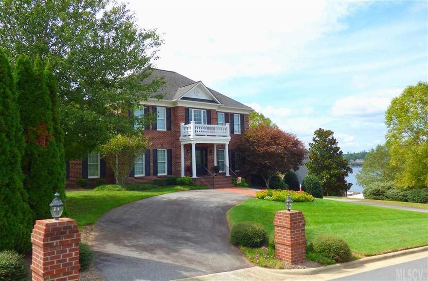 Pending before published. This stately Georgian home offers fantastic views of Lake Hickory and is move-in ready! A welcoming front porch leads into a two-story foyer opening onto both formal living and dining rooms. A large updated kitchen offers stainless steel appliances, breakfast area, and adjoining sunroom with exit to the rear patio. A cozy den has a gas fireplace, desk area, and amazing views of the water. You'll also find a master suite, laundry and half bath on the main level. On the second level two bedrooms share a hall bath and a 3rd bedroom offers a private bath and walk-in closet. The partial lower level offers a den/rec room, full bath, and large garage with storage closet. Top quality construction!